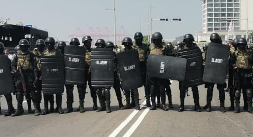 Security forces block protest march against taxes